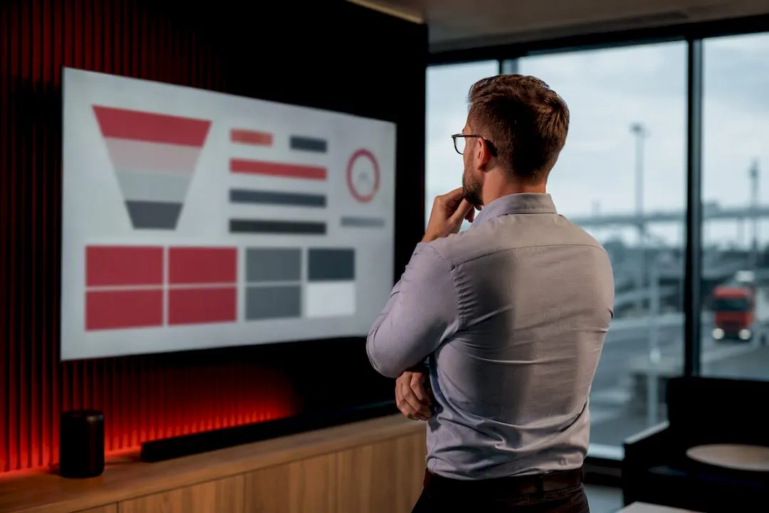 Recruitment analyst reviewing job board metrics